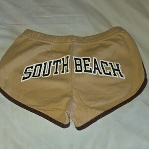 2 Pairs MIA Tan/white With Purple Letters Athletic Shorts
